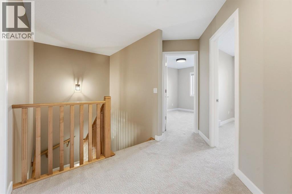 33 Prominence Park Sw, Calgary, AB - Indoor Photo Showing Other Room