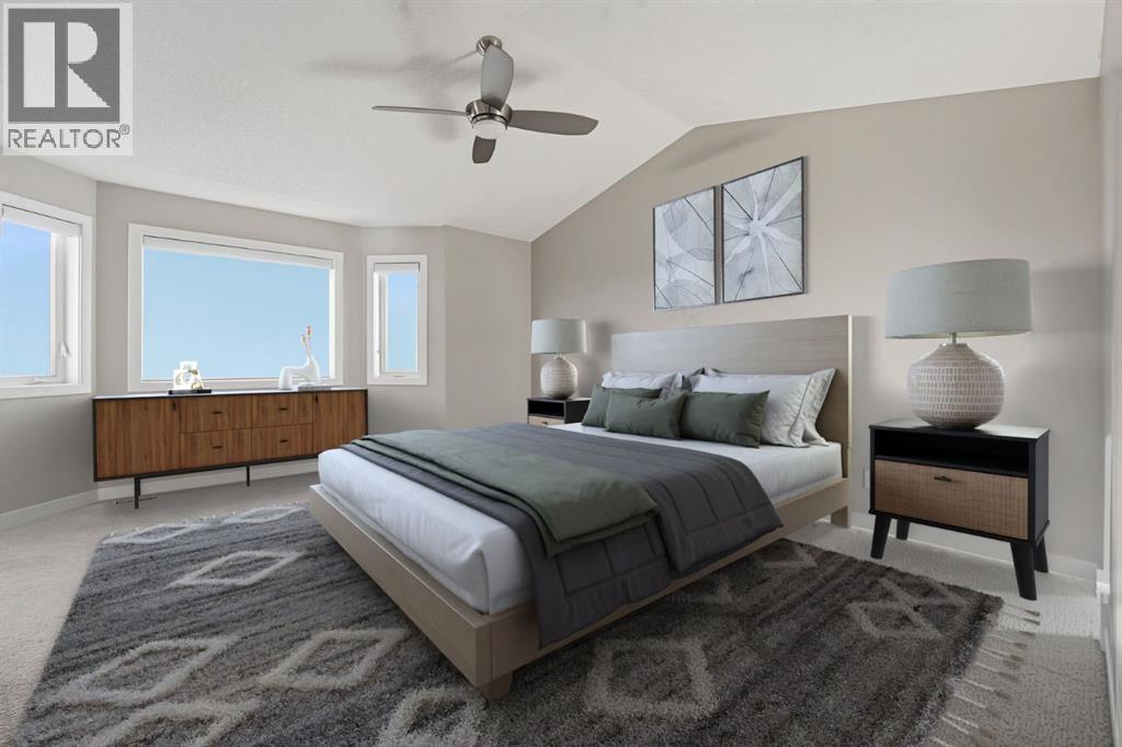 33 Prominence Park Sw, Calgary, AB - Indoor Photo Showing Bedroom