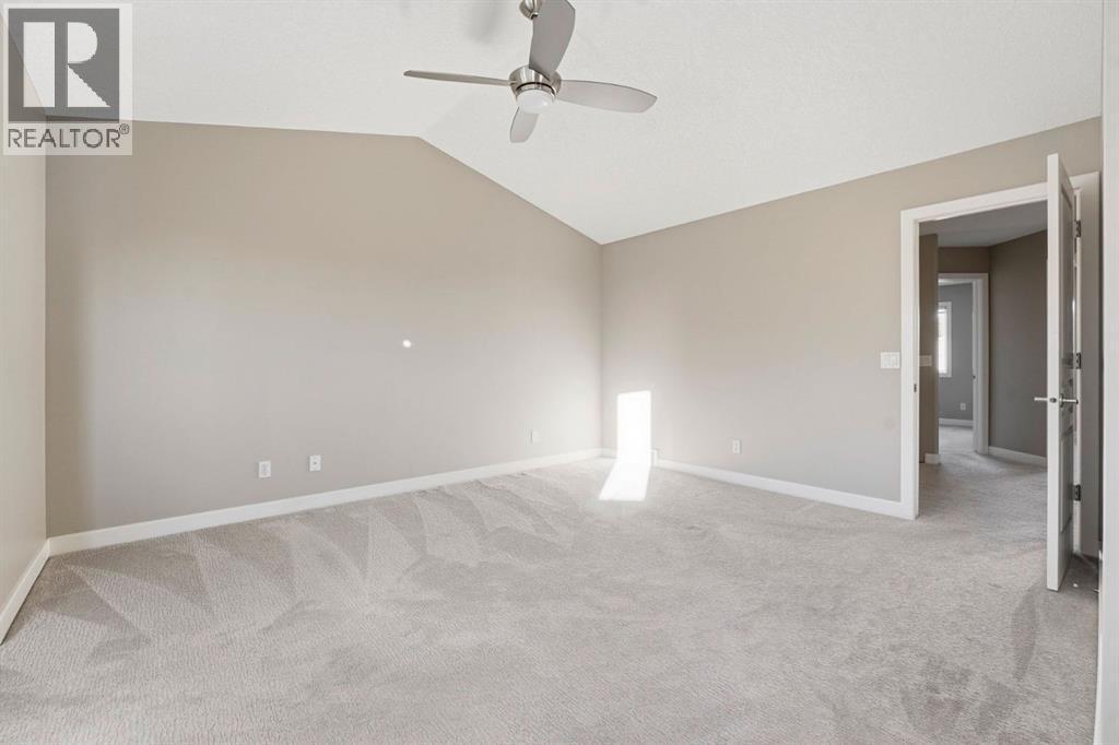 33 Prominence Park Sw, Calgary, AB - Indoor Photo Showing Other Room