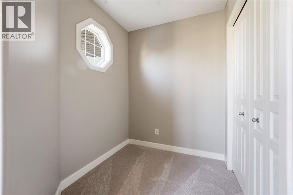 33 Prominence Park Sw, Calgary, AB - Indoor Photo Showing Other Room