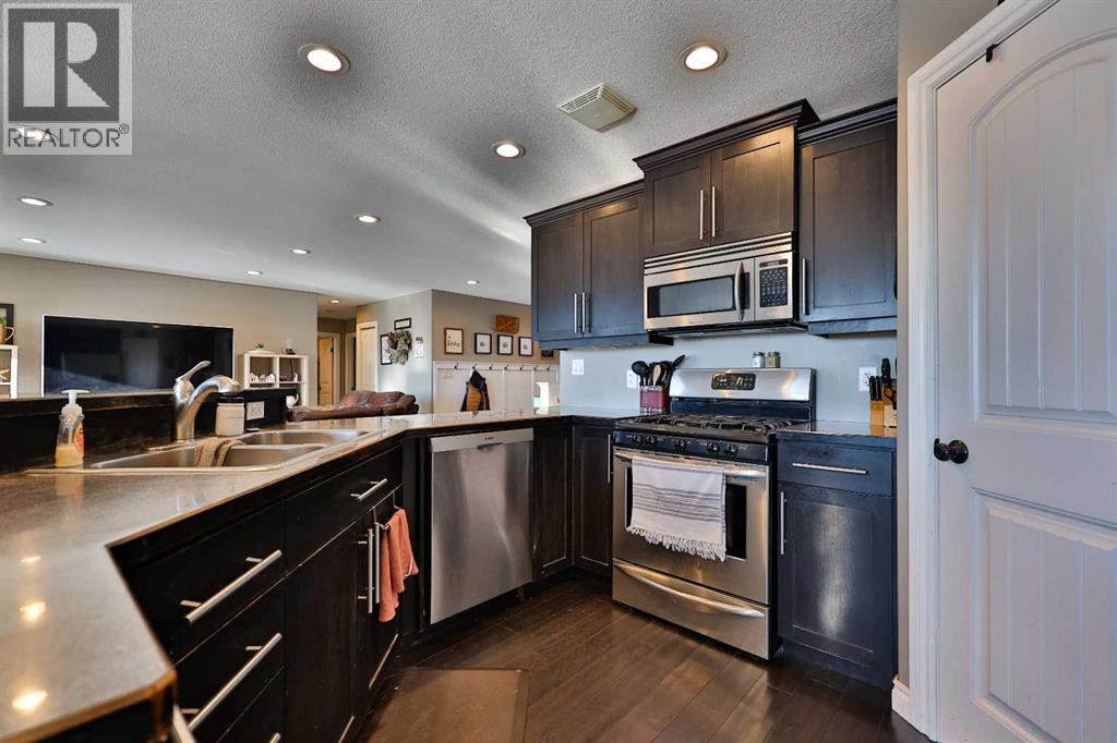 233073 Twp Rd 45, Spring Coulee, AB - Indoor Photo Showing Kitchen With Double Sink