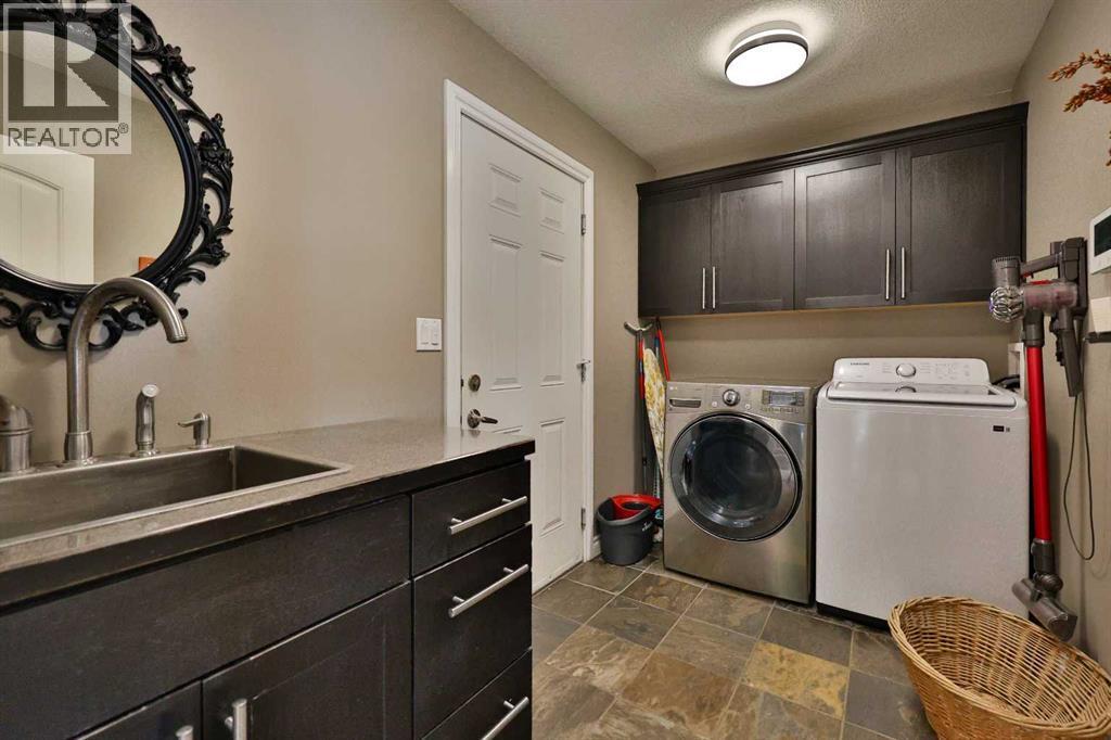 233073 Twp Rd 45, Spring Coulee, AB - Indoor Photo Showing Laundry Room