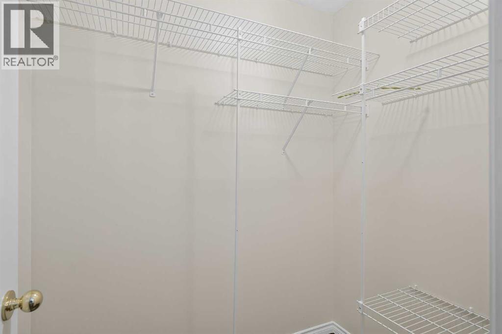 25 Westfall Drive, Okotoks, AB - Indoor With Storage