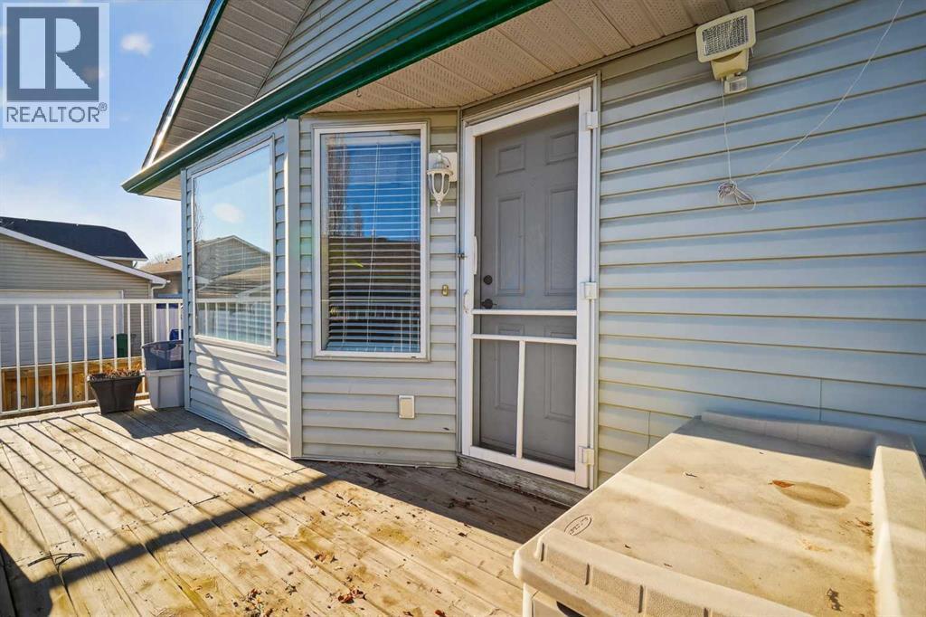 25 Westfall Drive, Okotoks, AB - Outdoor With Deck Patio Veranda With Exterior