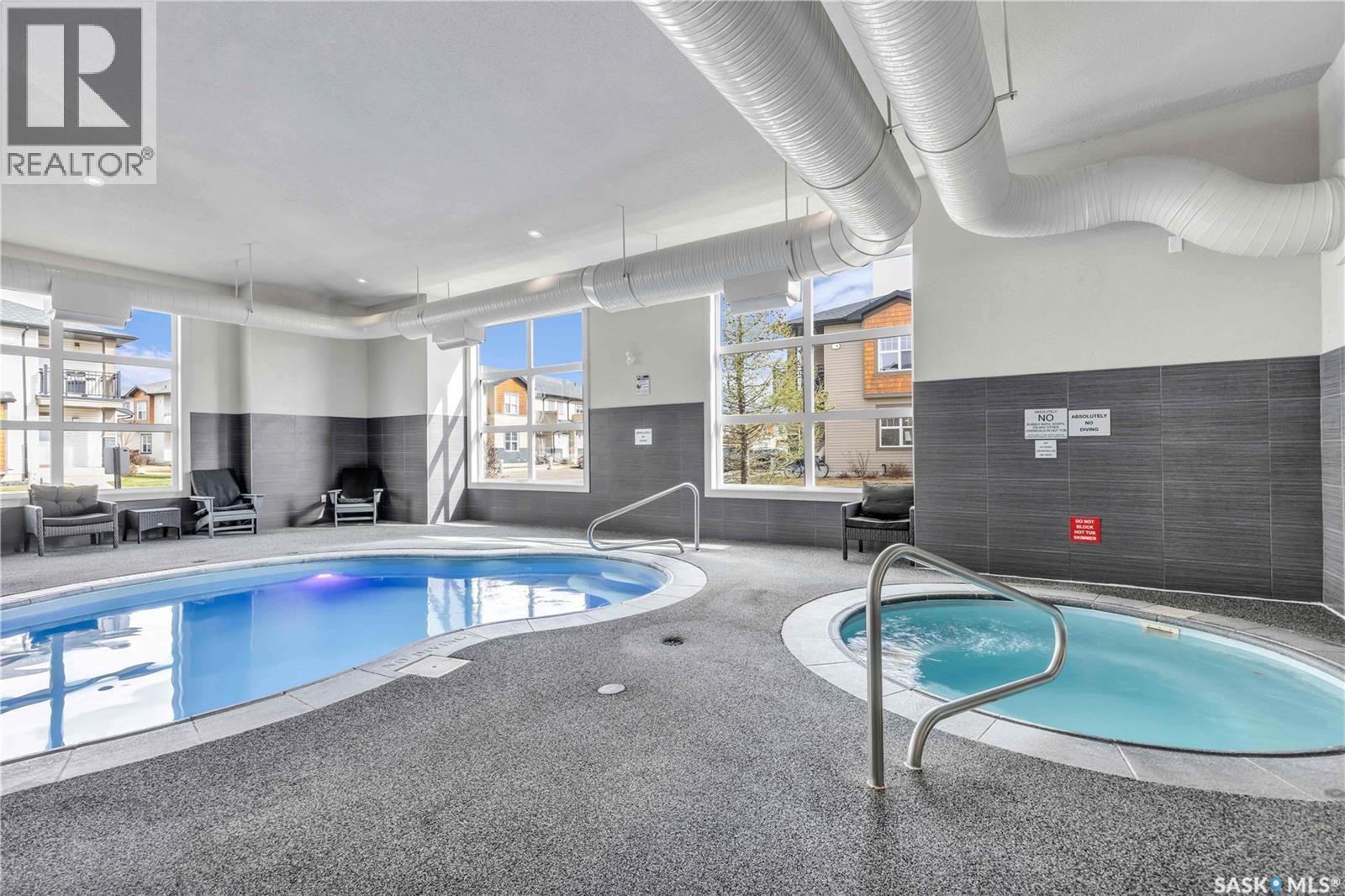 1207 1015 Patrick Crescent, Saskatoon, SK - Indoor Photo Showing Other Room With In Ground Pool