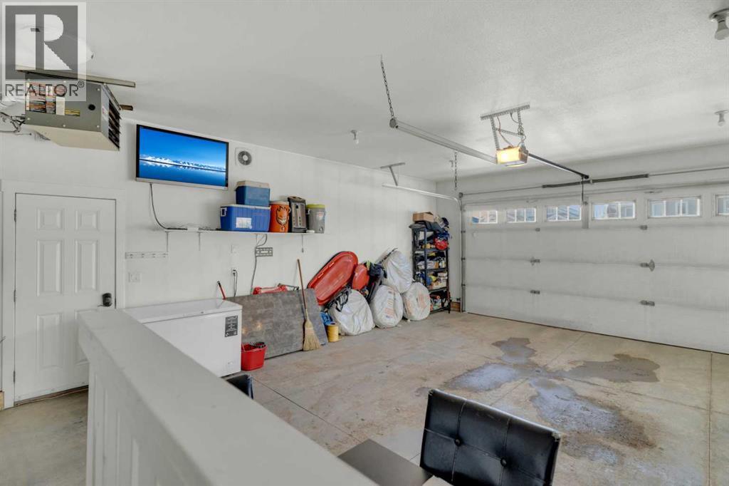 33 Sisson Avenue, Red Deer, AB - Indoor Photo Showing Garage