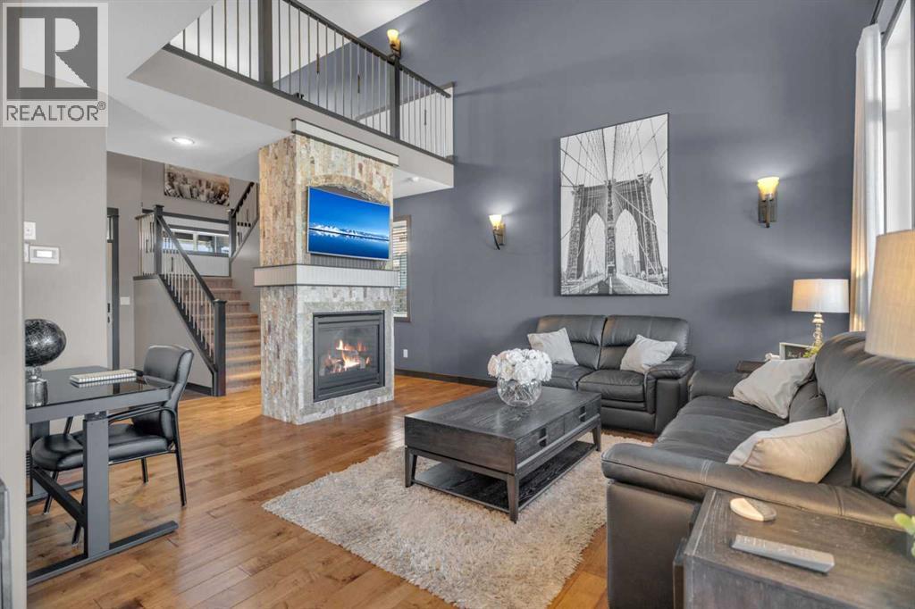 33 Sisson Avenue, Red Deer, AB - Indoor Photo Showing Living Room With Fireplace