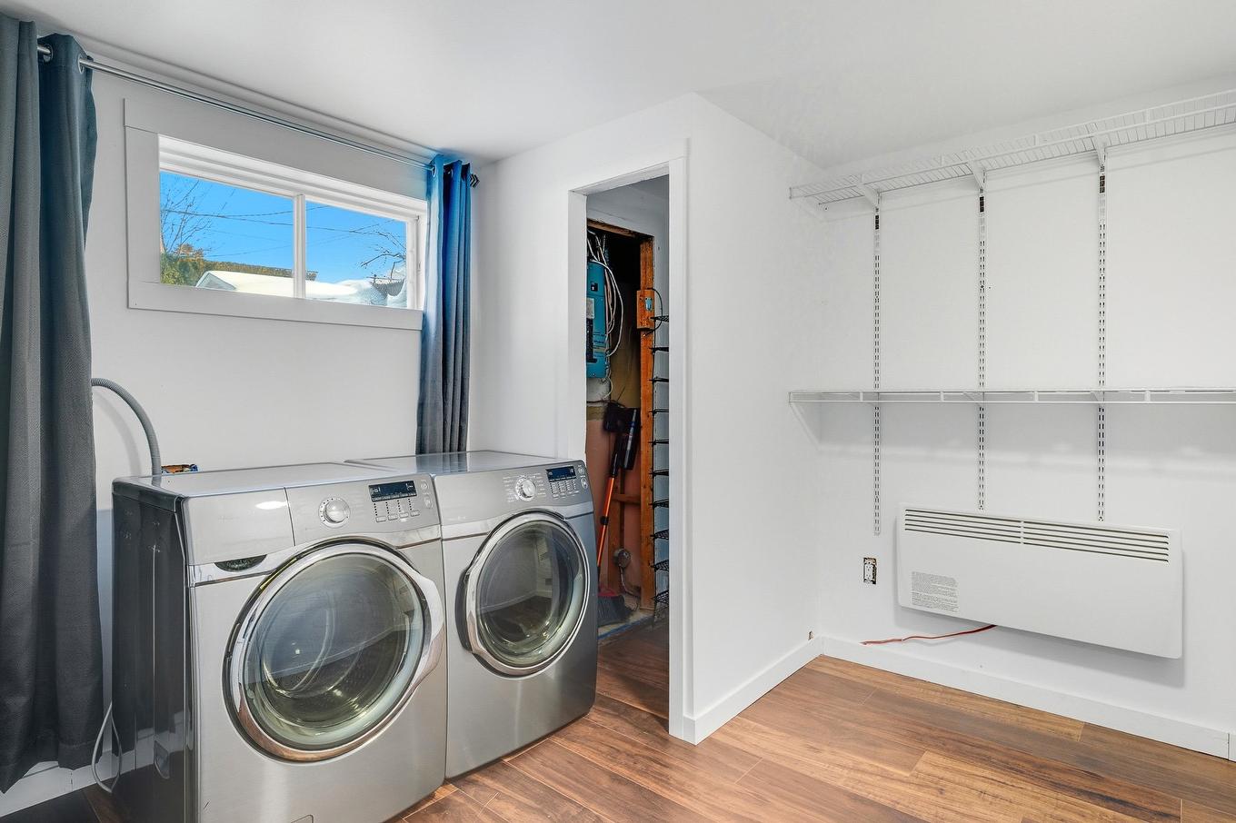 Salle de lavage - 5714 Rue Labrèche, Laval (Saint-François), QC - Indoor Photo Showing Laundry Room