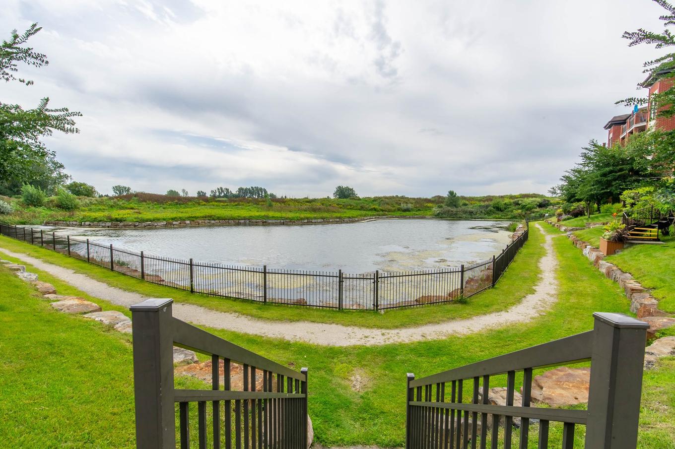 Bord de l'eau - 403-120 Av. Du Golf, La Prairie, QC - Outdoor With View