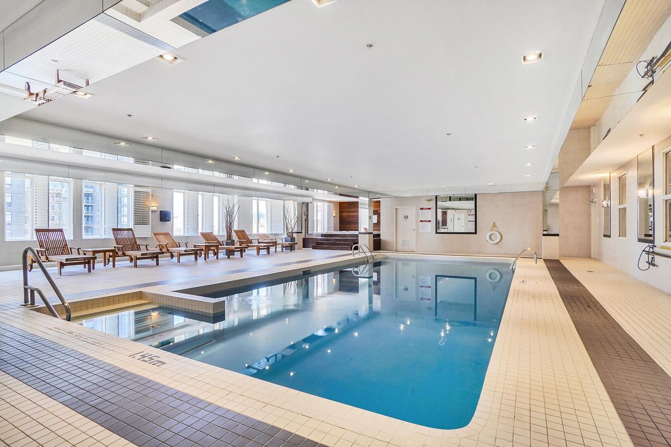 Pool - 216-2160 Av. Terry-Fox, Laval (Chomedey), QC - Indoor Photo Showing Other Room With In Ground Pool