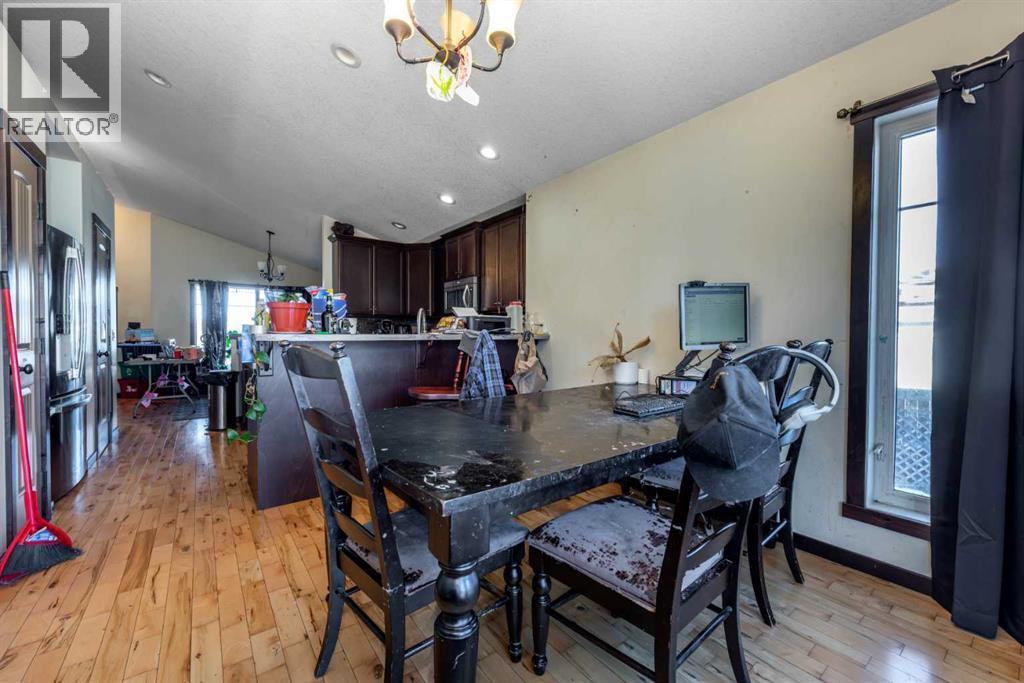 100 Willow Ridge Link, Diamond Valley, AB - Indoor Photo Showing Dining Room