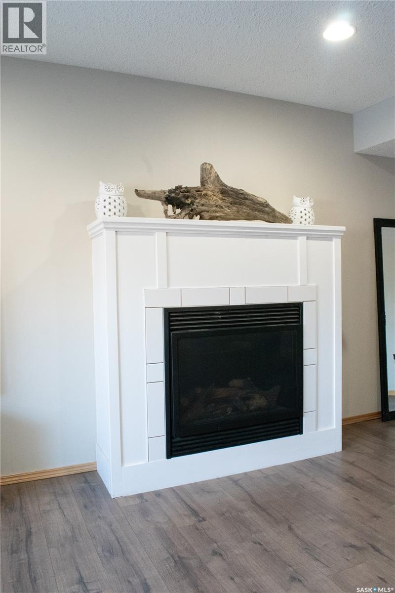 2907 15Th Avenue E, Prince Albert, SK - Indoor Photo Showing Living Room With Fireplace