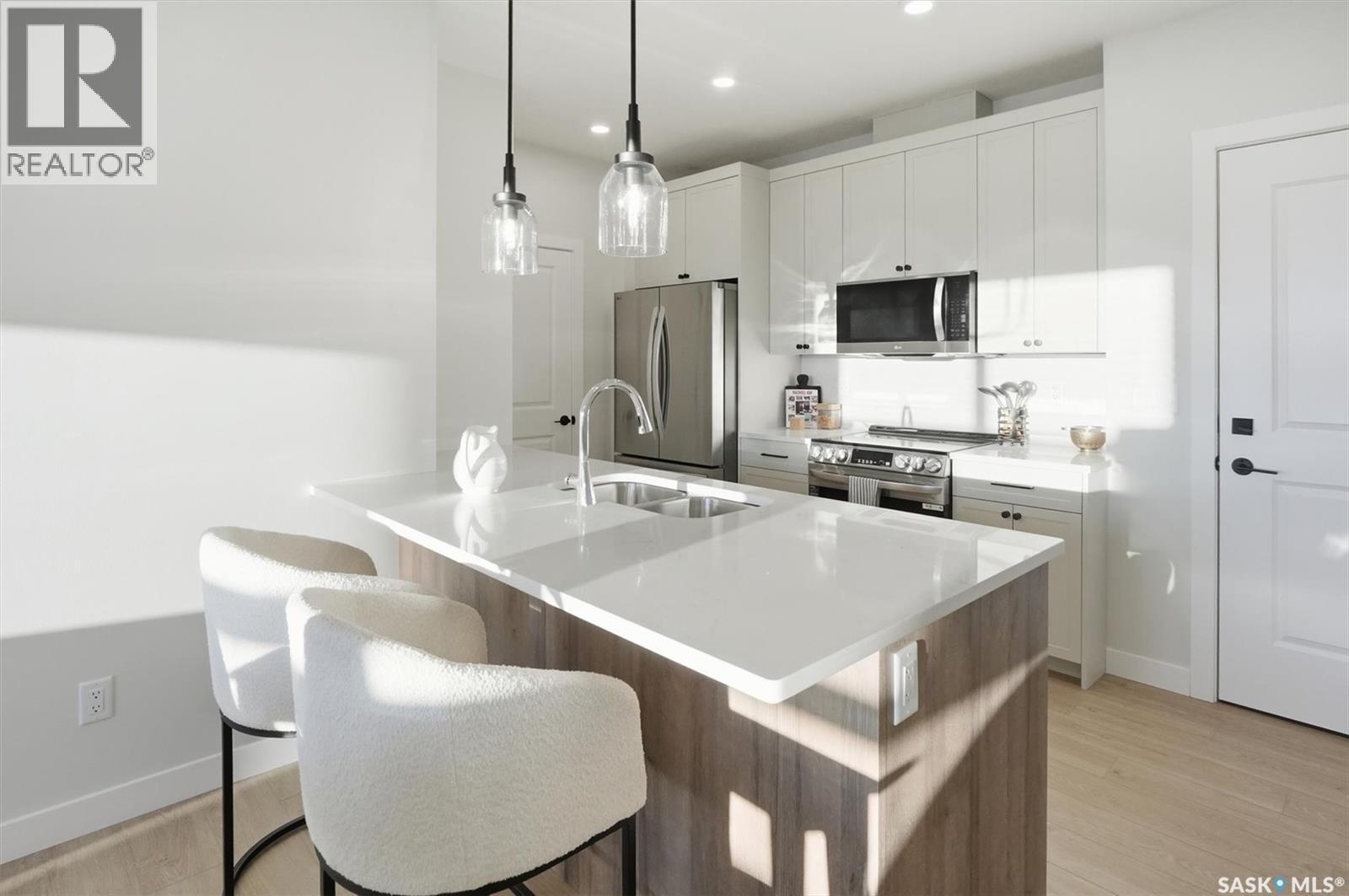 1203 101 Secord Way, Saskatoon, SK - Indoor Photo Showing Kitchen With Double Sink With Upgraded Kitchen