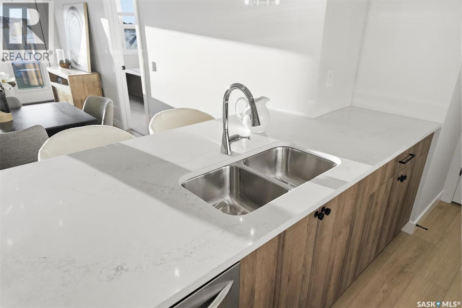 1203 101 Secord Way, Saskatoon, SK - Indoor Photo Showing Kitchen With Double Sink