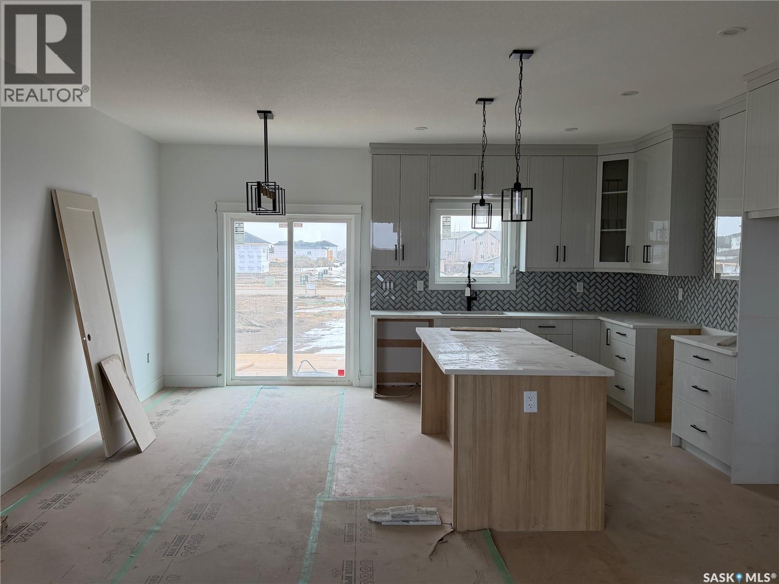 983 Nightingale Bend, Saskatoon, SK - Indoor Photo Showing Kitchen With Upgraded Kitchen
