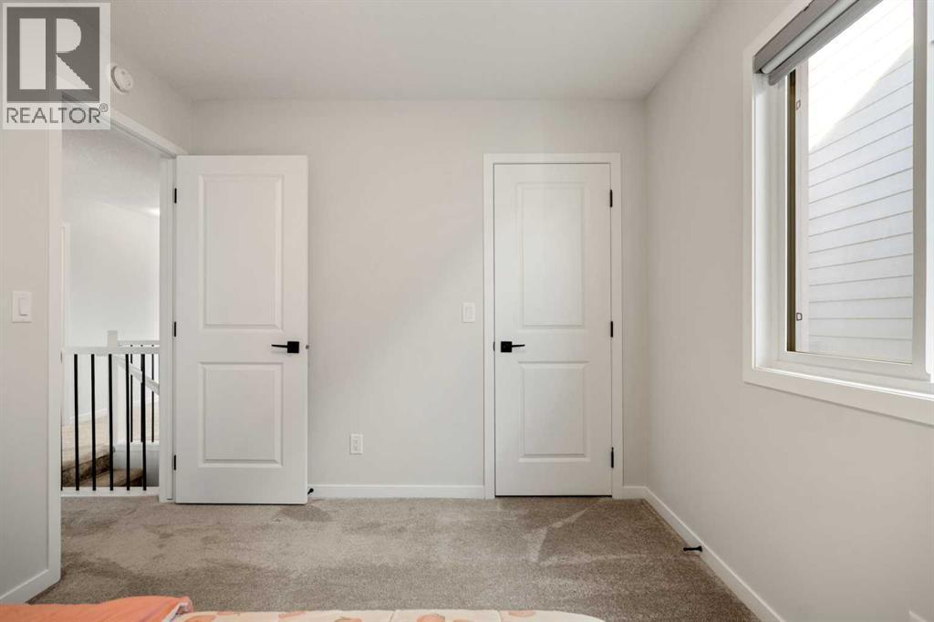 40 West Grove Link Sw, Calgary, AB - Indoor Photo Showing Other Room