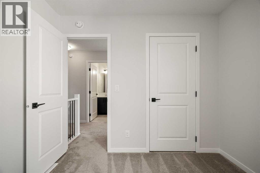 40 West Grove Link Sw, Calgary, AB - Indoor Photo Showing Other Room