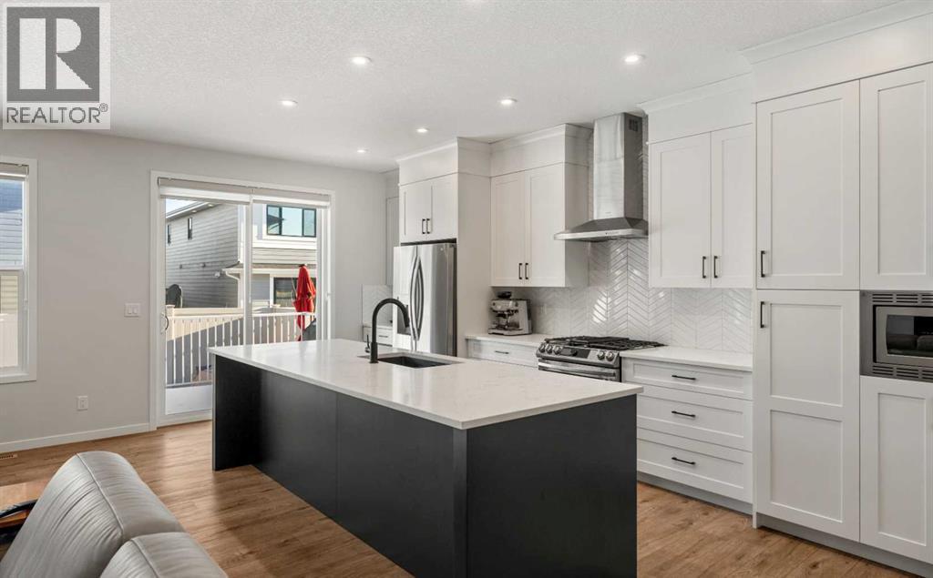 40 West Grove Link Sw, Calgary, AB - Indoor Photo Showing Kitchen With Upgraded Kitchen