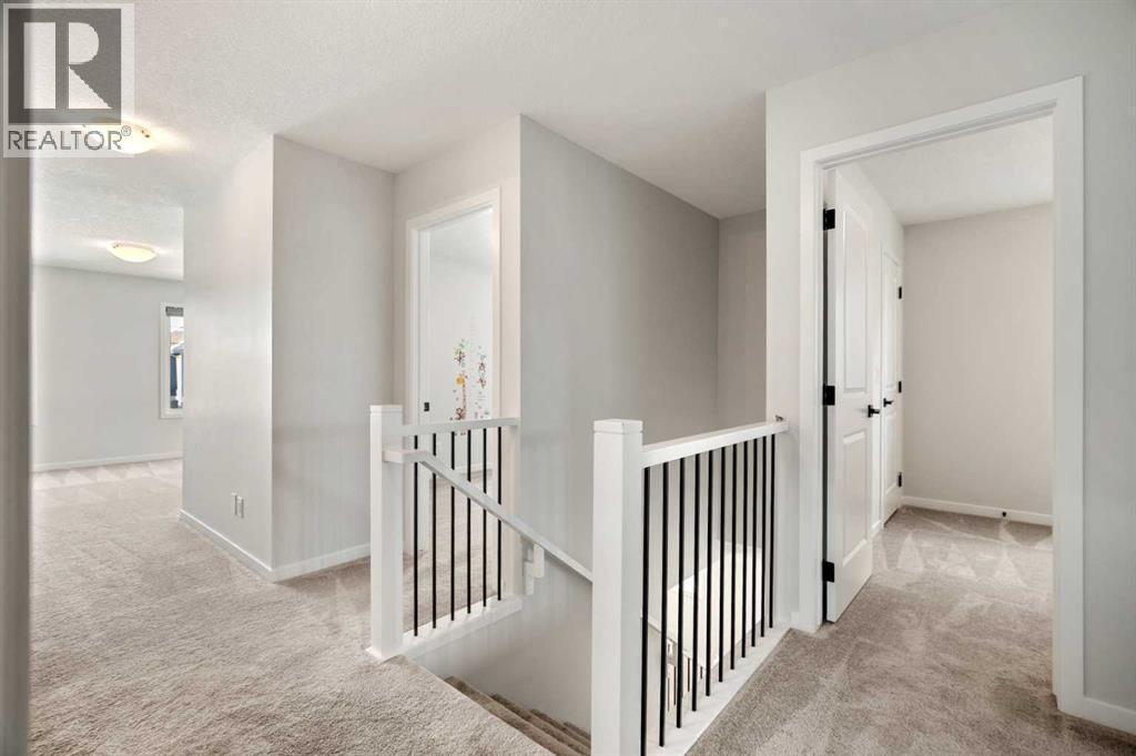 40 West Grove Link Sw, Calgary, AB - Indoor Photo Showing Other Room