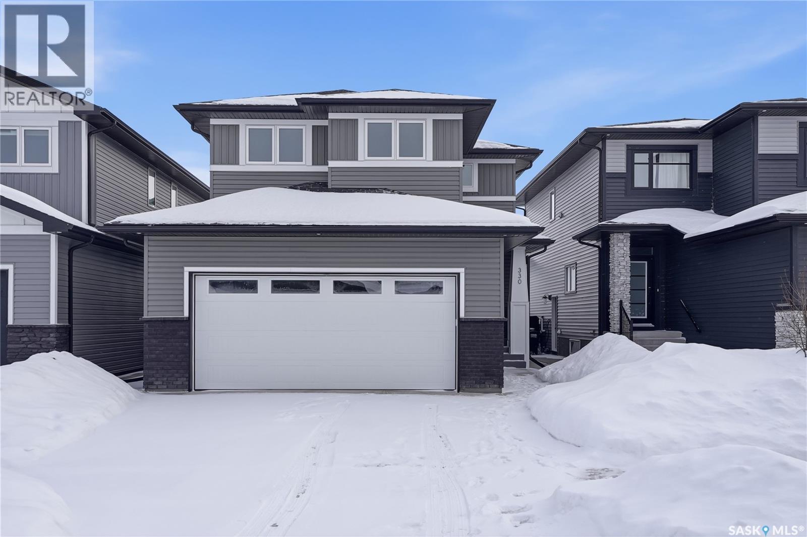 330 Aniskotaw Bend, Saskatoon, SK - Outdoor With Facade