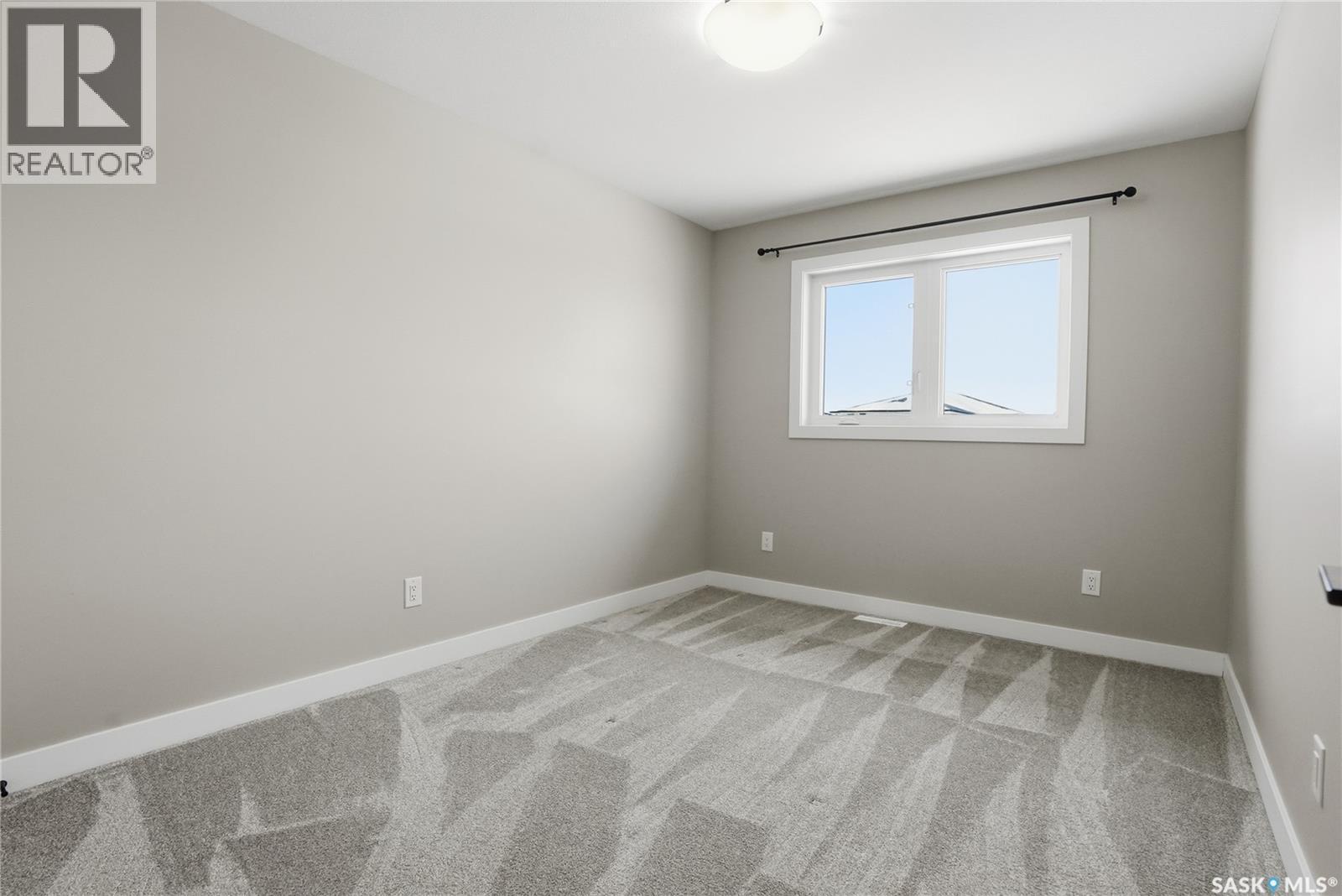 330 Aniskotaw Bend, Saskatoon, SK - Indoor Photo Showing Other Room