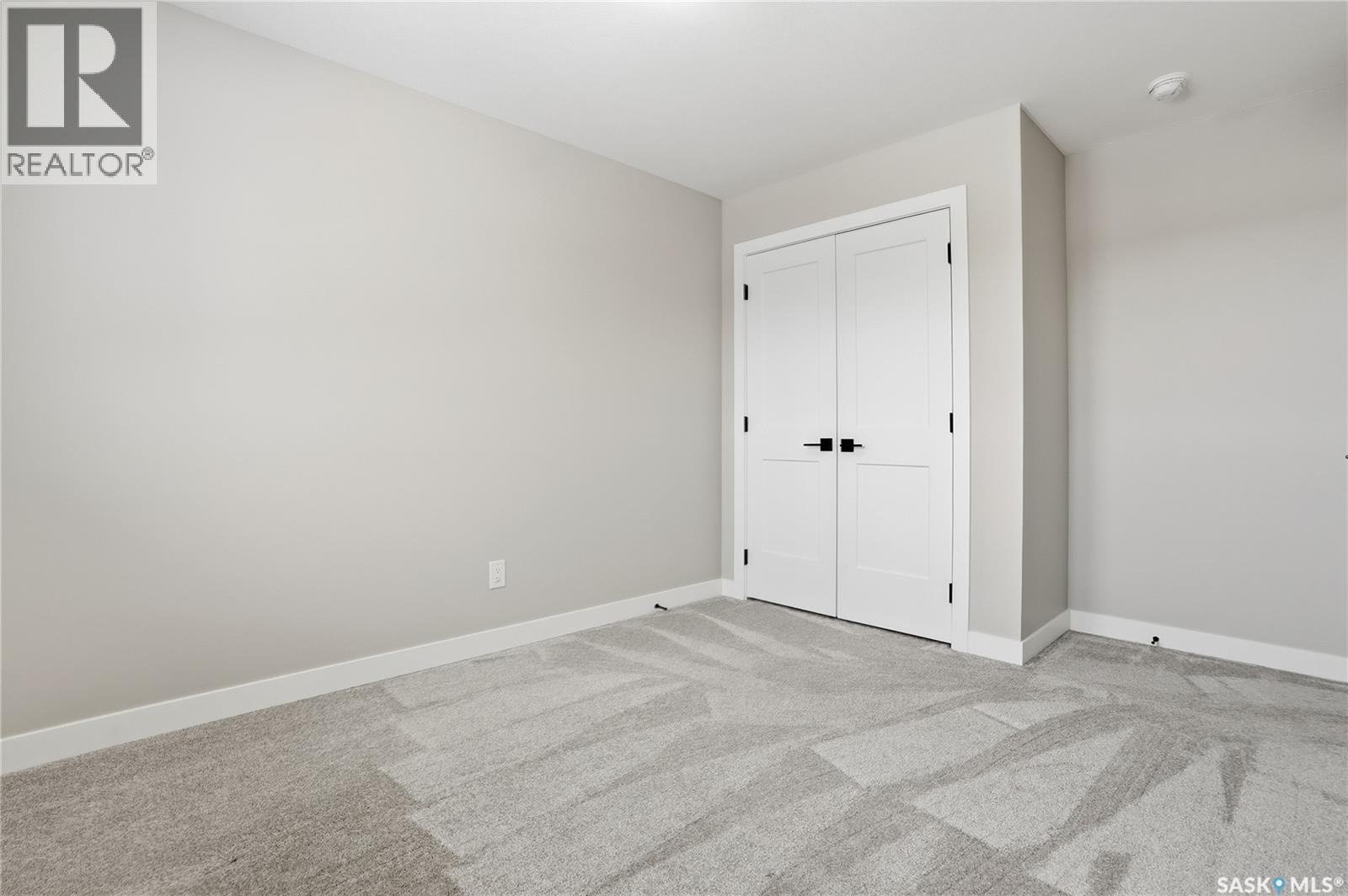 330 Aniskotaw Bend, Saskatoon, SK - Indoor Photo Showing Other Room