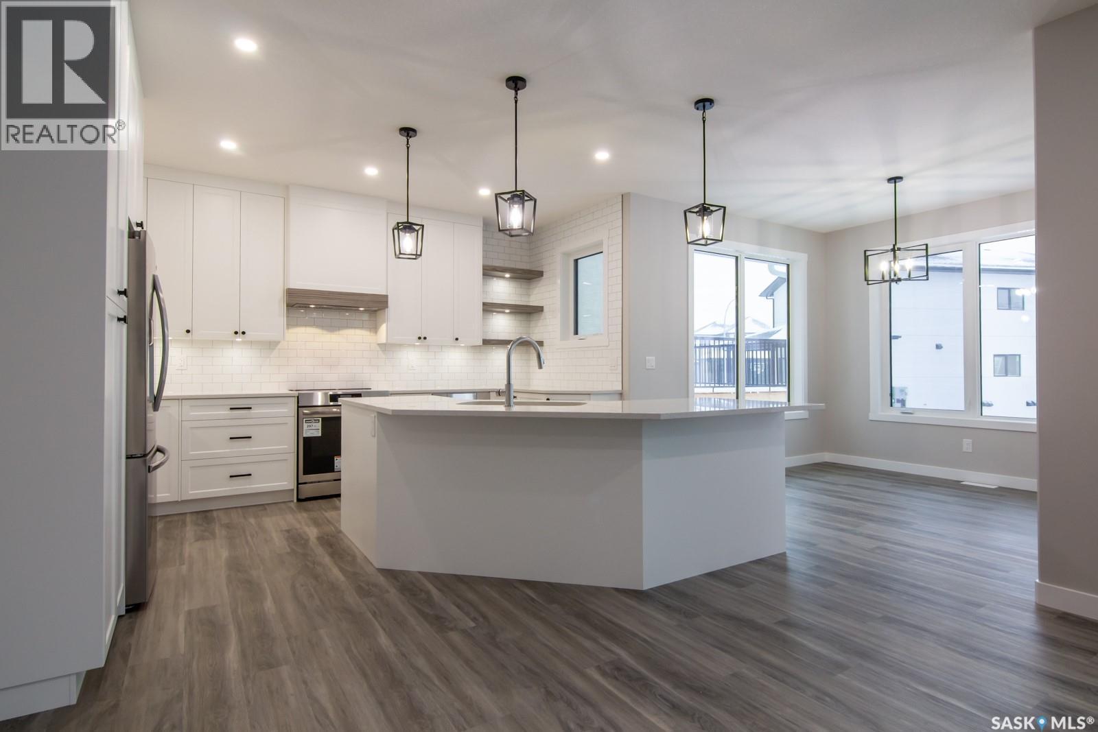 203 Sharma Lane, Saskatoon, SK - Indoor Photo Showing Kitchen With Upgraded Kitchen