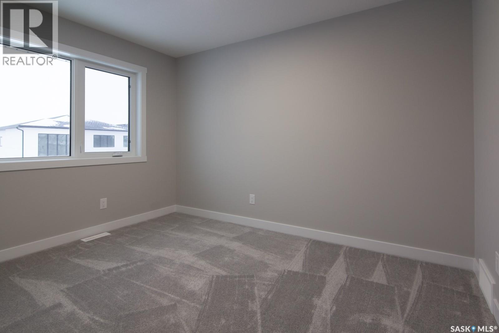 203 Sharma Lane, Saskatoon, SK - Indoor Photo Showing Other Room