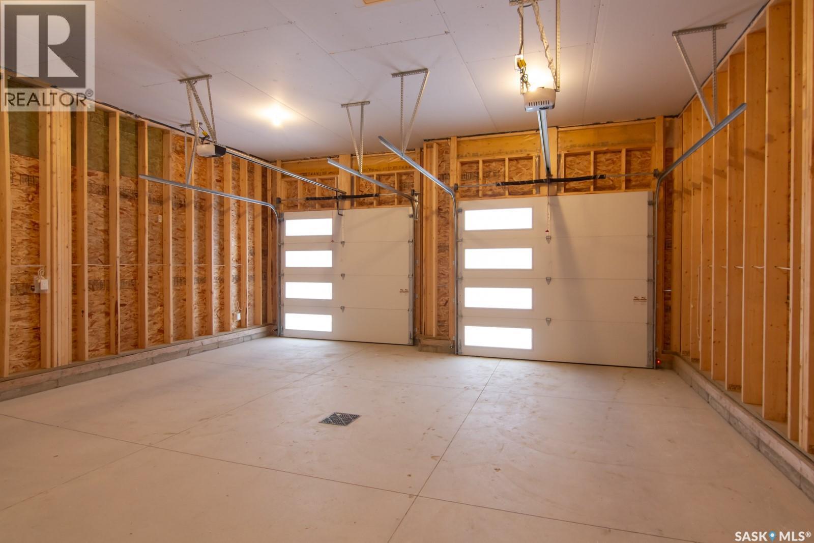 203 Sharma Lane, Saskatoon, SK - Indoor Photo Showing Garage