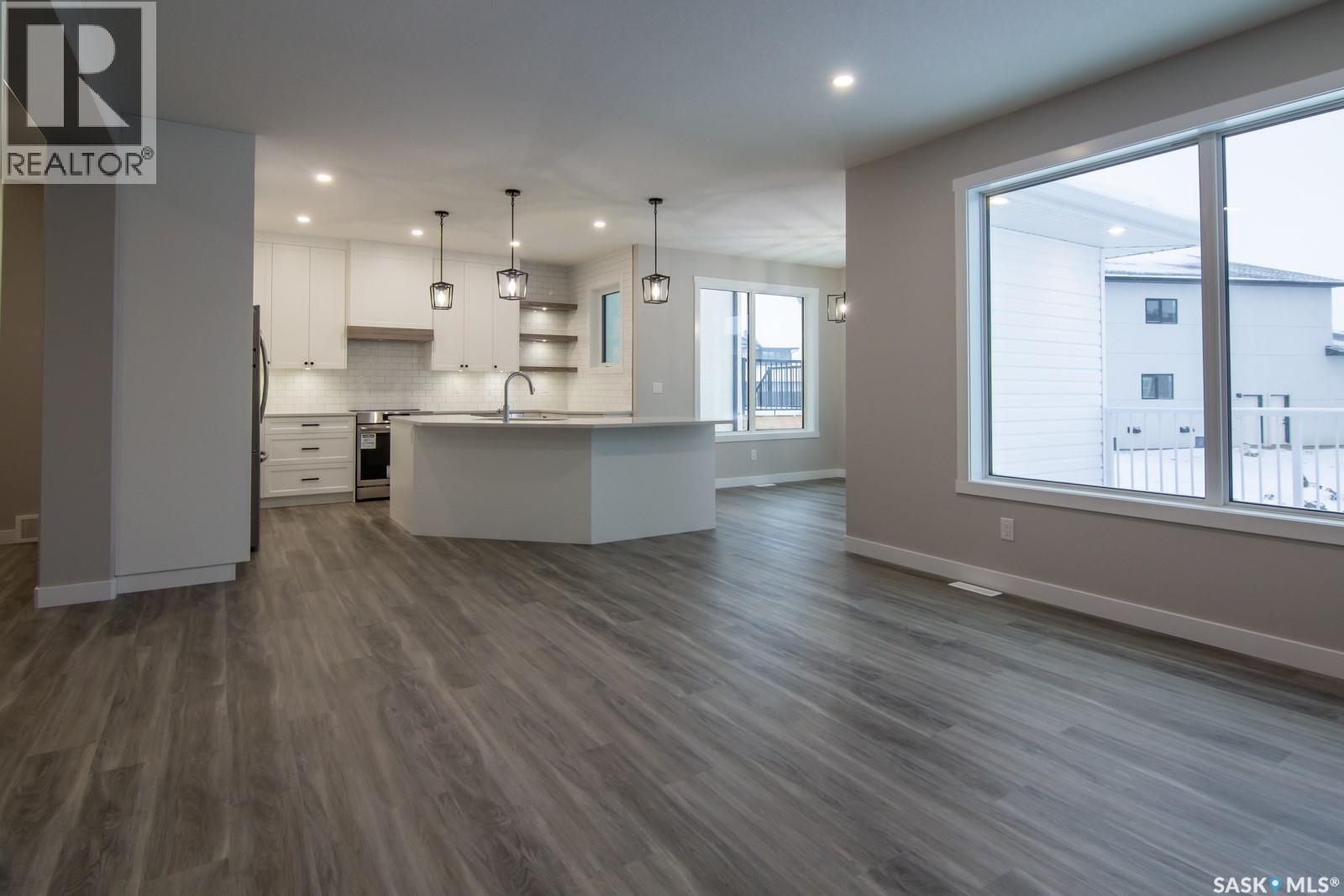 203 Sharma Lane, Saskatoon, SK - Indoor Photo Showing Kitchen With Upgraded Kitchen