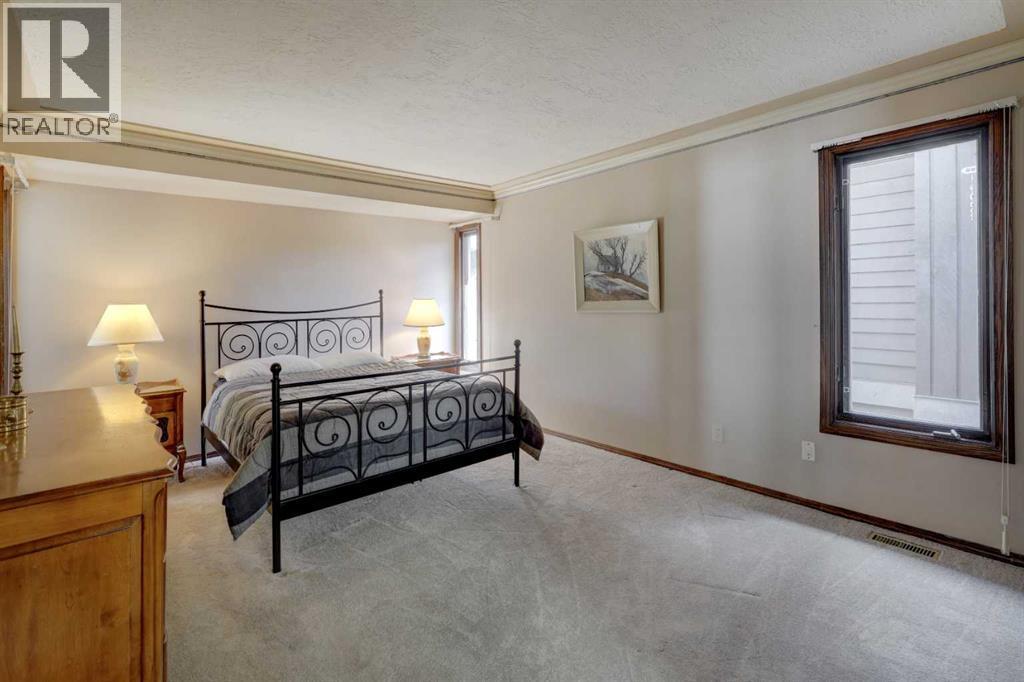 76 Edgeland Road Nw, Calgary, AB - Indoor Photo Showing Bedroom