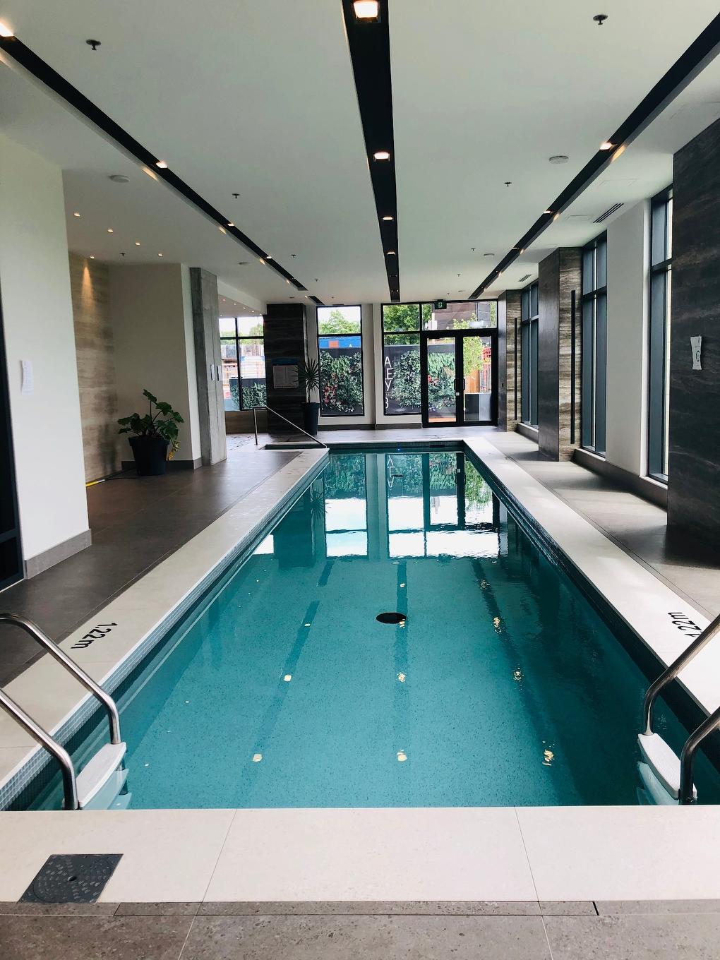 Pool - 409-1320 Rue Olier, Montréal (Le Sud-Ouest), QC - Indoor Photo Showing Other Room With In Ground Pool