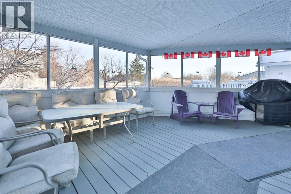 196 W 100 S, Raymond, AB - Outdoor With Deck Patio Veranda