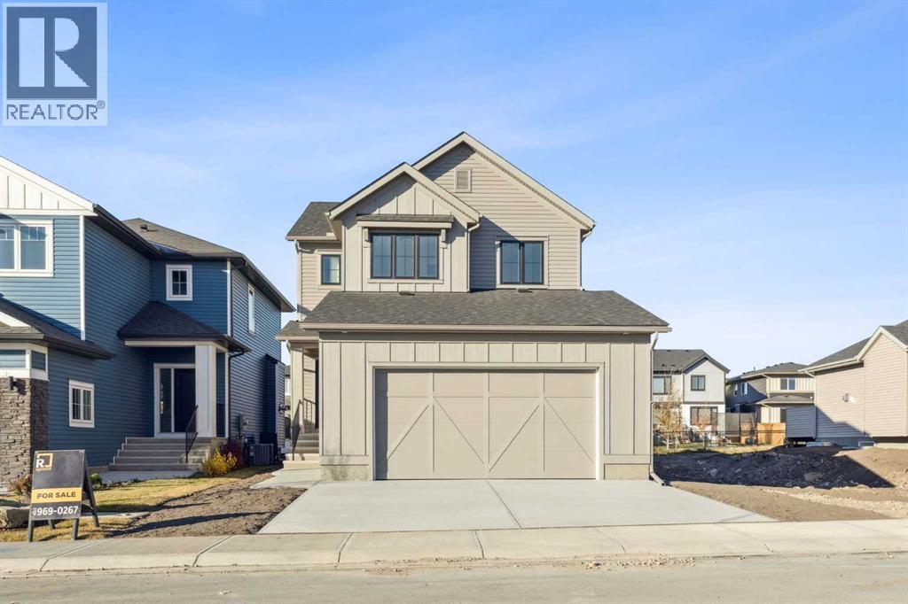 120 Quartz Crescent, Cochrane, AB - Outdoor With Facade
