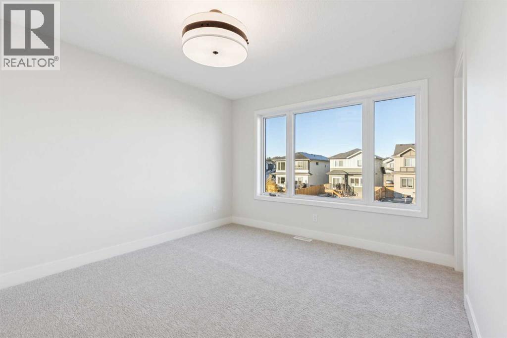 120 Quartz Crescent, Cochrane, AB - Indoor Photo Showing Other Room