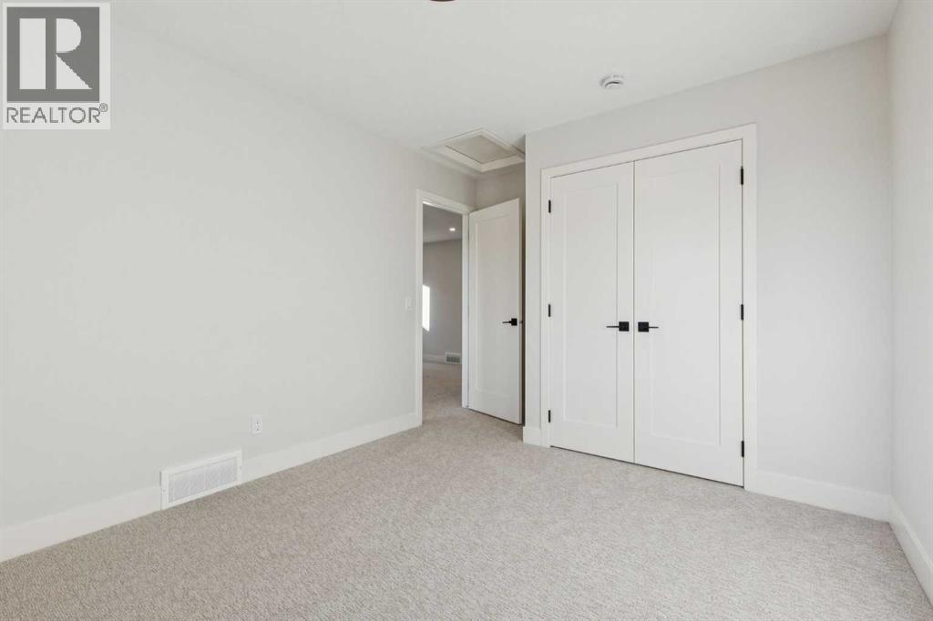 120 Quartz Crescent, Cochrane, AB - Indoor Photo Showing Other Room