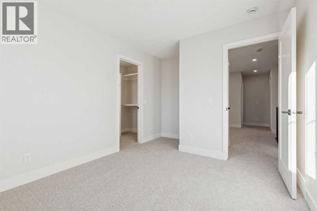 120 Quartz Crescent, Cochrane, AB - Indoor Photo Showing Other Room