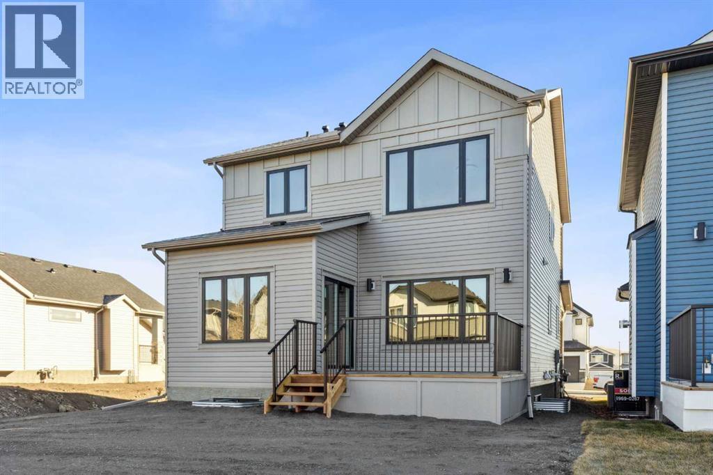 120 Quartz Crescent, Cochrane, AB - Outdoor With Exterior