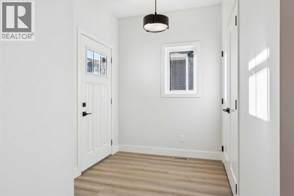 120 Quartz Crescent, Cochrane, AB - Indoor Photo Showing Other Room