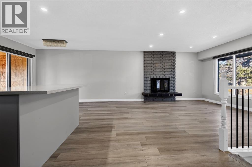 255 Rundleridge Drive Ne, Calgary, AB - Indoor With Fireplace