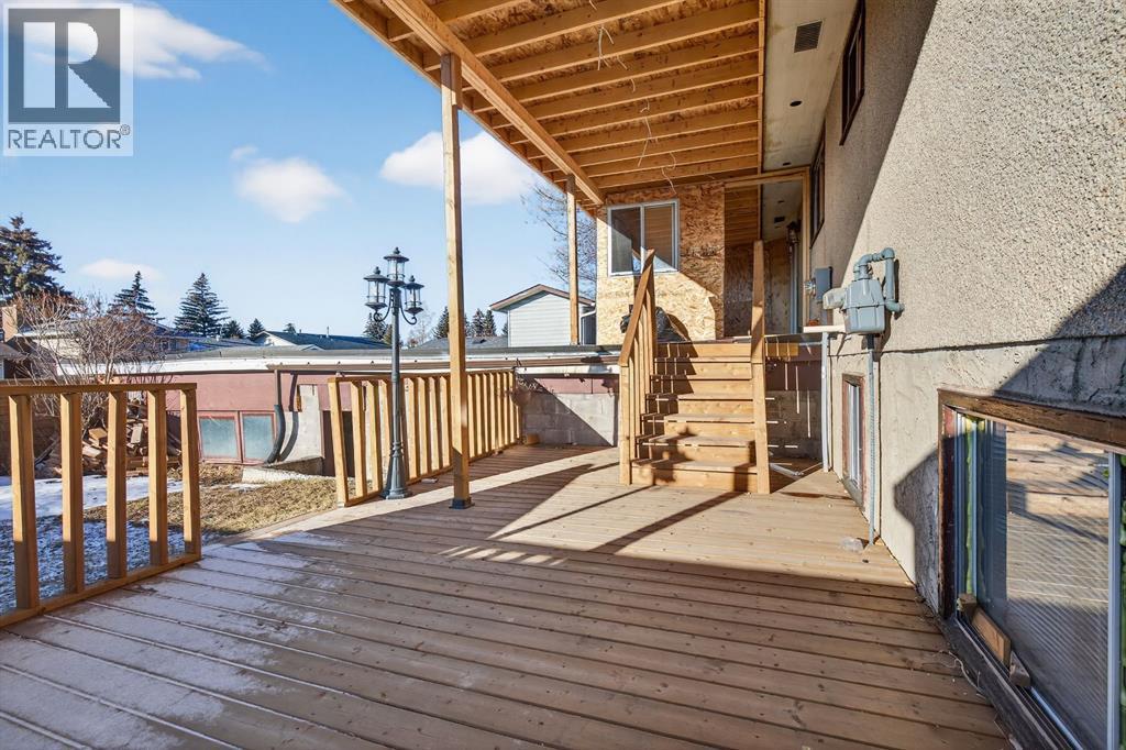 255 Rundleridge Drive Ne, Calgary, AB - Outdoor With Deck Patio Veranda With Exterior