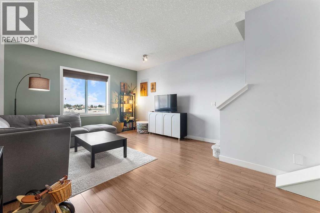 39 Silverado Way Sw, Calgary, AB - Indoor Photo Showing Living Room