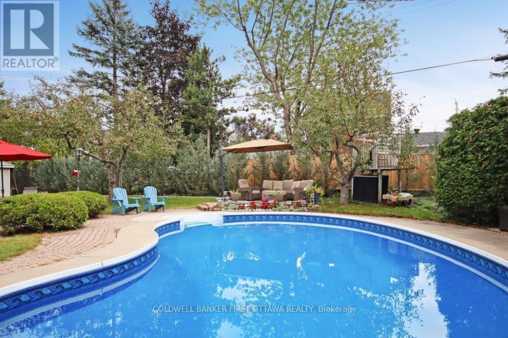 413 Island Park Drive, Ottawa, ON - Outdoor With In Ground Pool With Backyard
