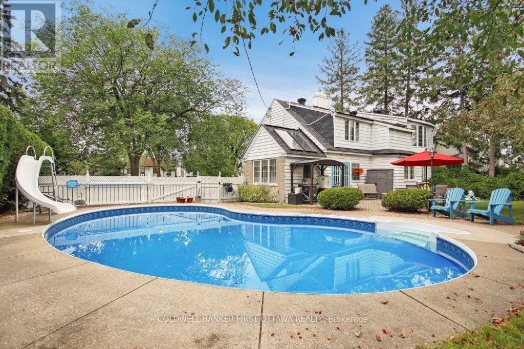 413 Island Park Drive, Ottawa, ON - Outdoor With In Ground Pool With Backyard