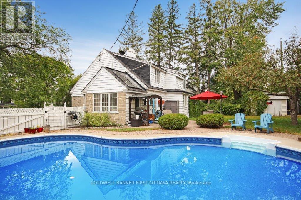 413 Island Park Drive, Ottawa, ON - Outdoor With In Ground Pool With Backyard