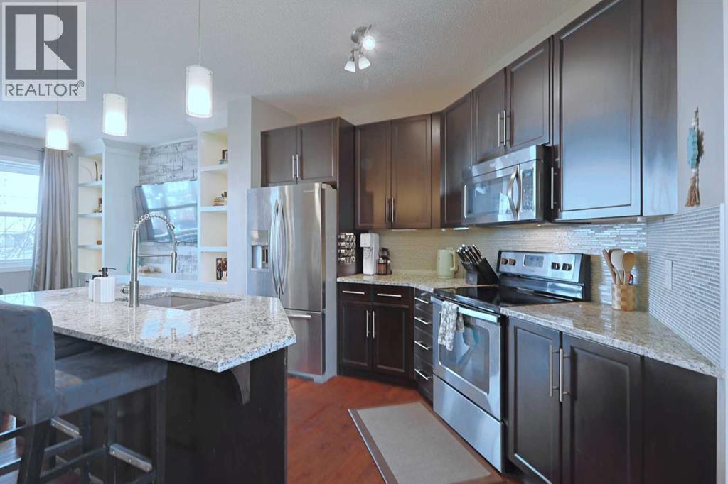 27 Nolanlake Point Nw, Calgary, AB - Indoor Photo Showing Kitchen With Stainless Steel Kitchen With Upgraded Kitchen