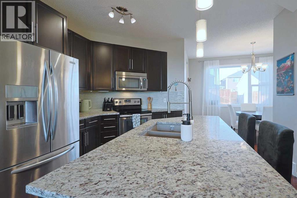 27 Nolanlake Point Nw, Calgary, AB - Indoor Photo Showing Kitchen With Stainless Steel Kitchen With Double Sink With Upgraded Kitchen