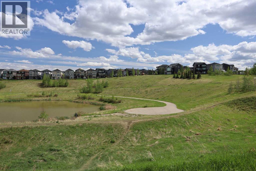 Across from Ravine & Pond - 27 Nolanlake Point Nw, Calgary, AB - Outdoor With View