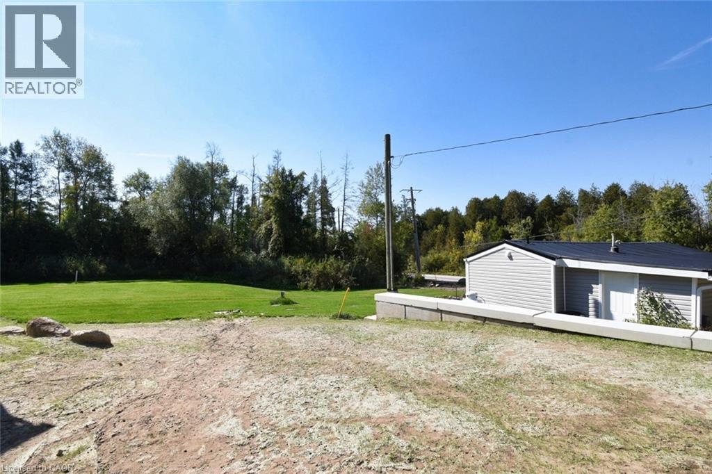 View of grassy yard - 1085 Concession 10 Road W Unit# 23, Flamborough, ON - Outdoor