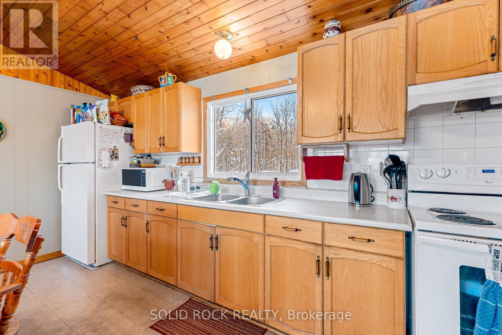 14 Lower Lake Lane, Frontenac (Frontenac South), ON - Indoor Photo Showing Kitchen With Double Sink